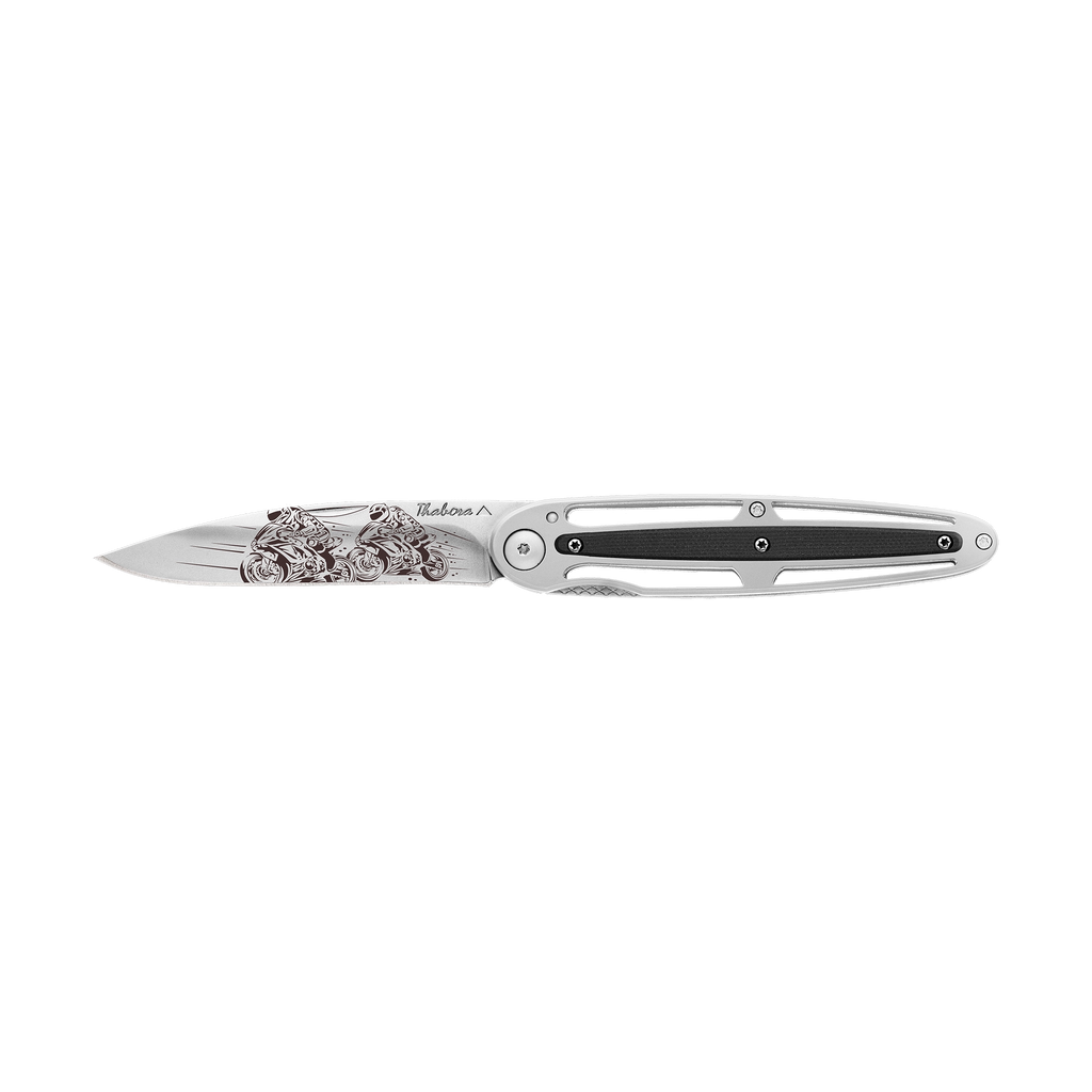 Couteau acier finition titane gris plaquette pleine résine g10 noir motif «cycliste»