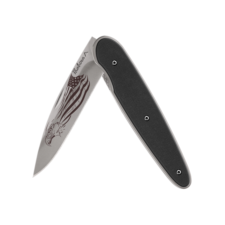 Couteau acier finition titane gris plaquette pleine résine g10 noir motif «aigle américain»