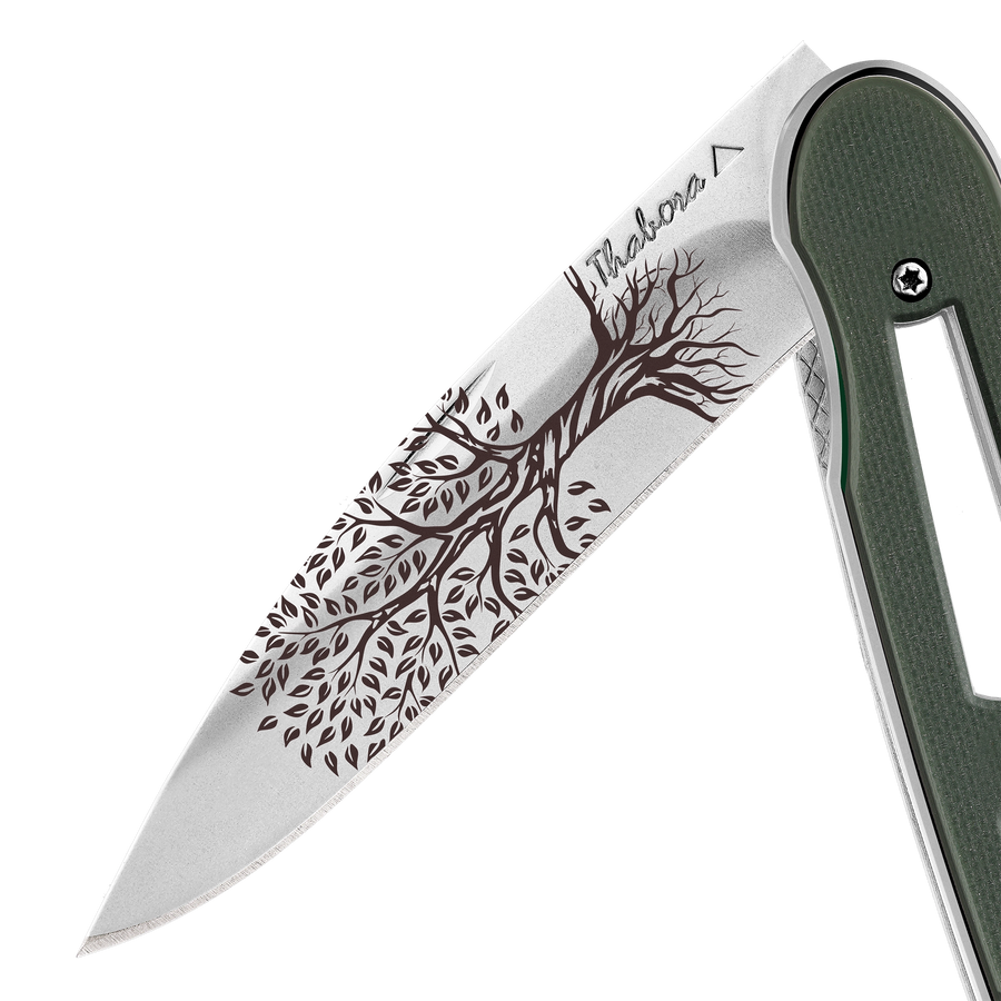Couteau acier finition brillante plaquette ajourée résine g10 kaki motif «arbre de vie»