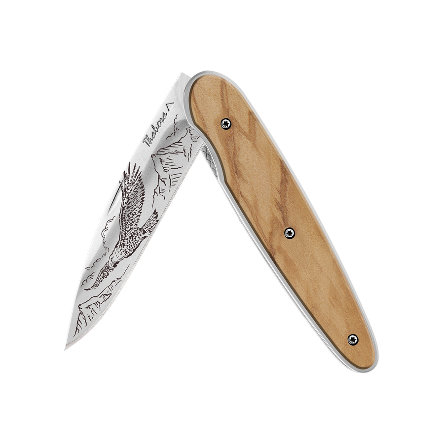 Couteau acier finition brillante plaquette pleine bois clair motif «aigle»