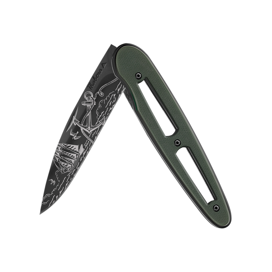 Couteau acier finition titane noir plaquette ajourée résine g10 kaki motif «océan»