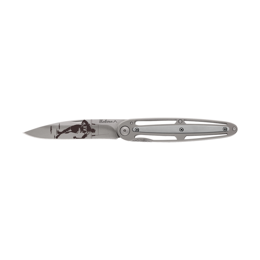 Couteau acier finition titane gris plaquette centrale acier brossé motif «rugby»