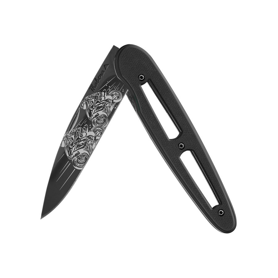 Couteau acier finition titane noir plaquette ajourée résine g10 noir motif «motos de course»