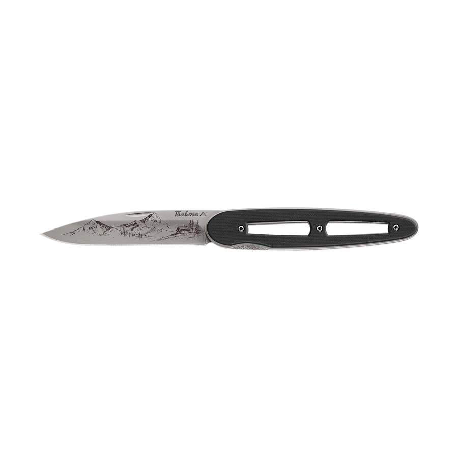 Couteau acier finition titane gris plaquette ajourée résine g10 noir motif «montagne»