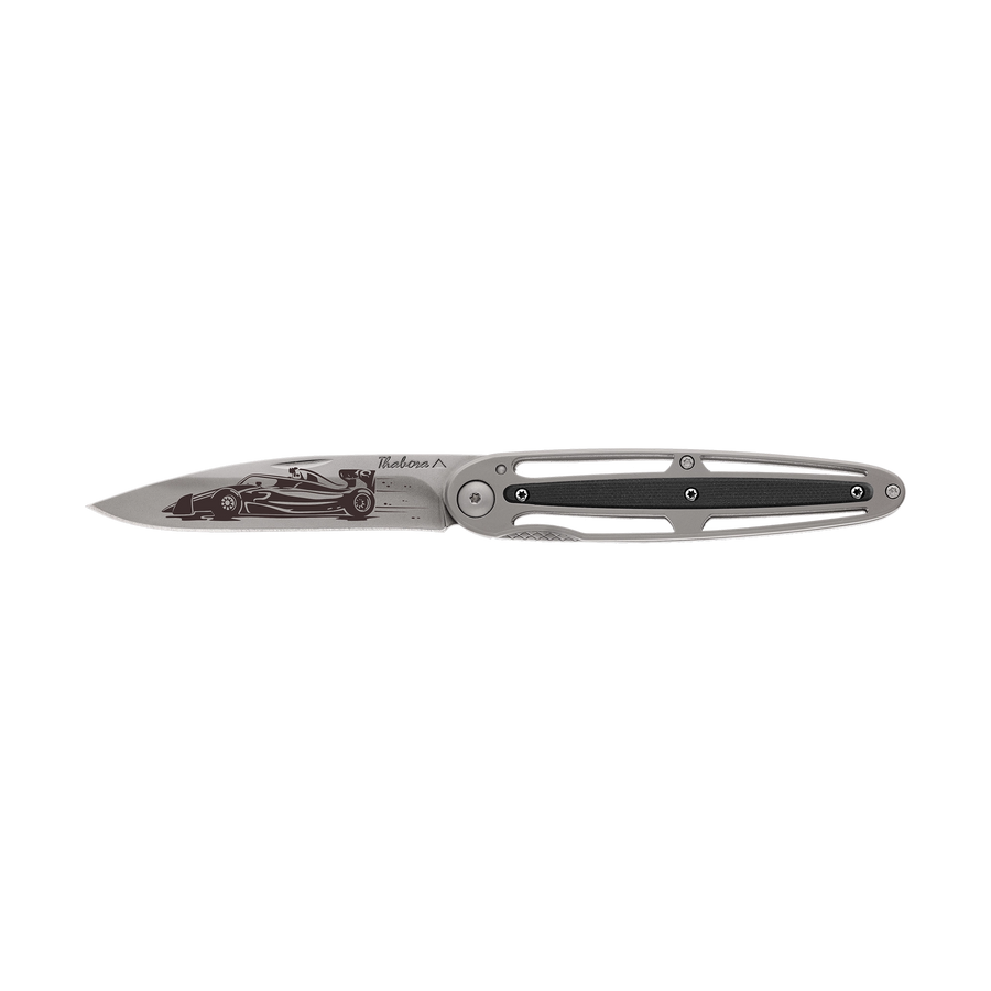 Couteau acier finition titane gris plaquette centrale résine g10 noir motif «formule 1»