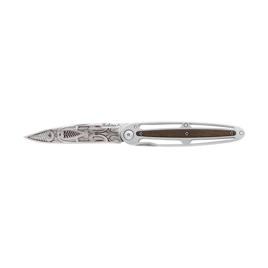 Couteau acier finition brillante plaquette centrale bois foncé motif «cachemire»