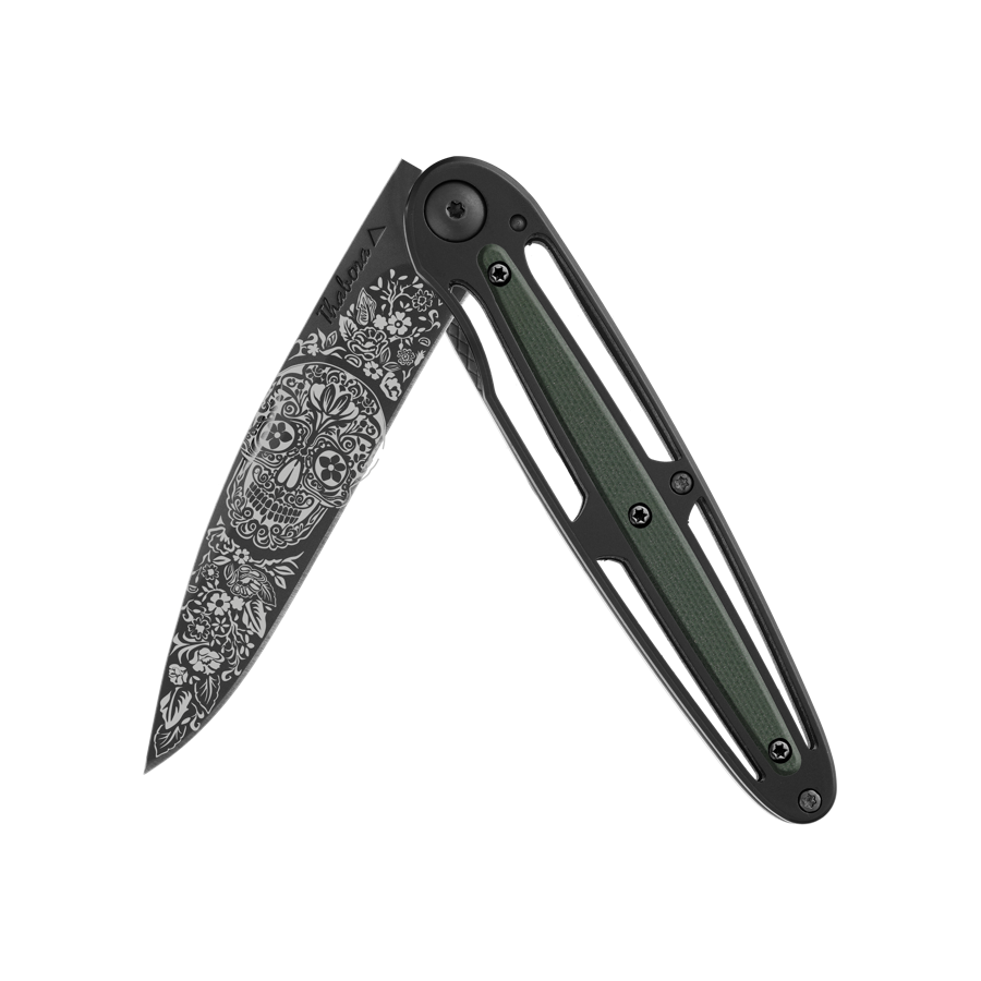 Couteau acier finition titane noir plaquette centrale résine g10 kaki motif «tête mexicaine»
