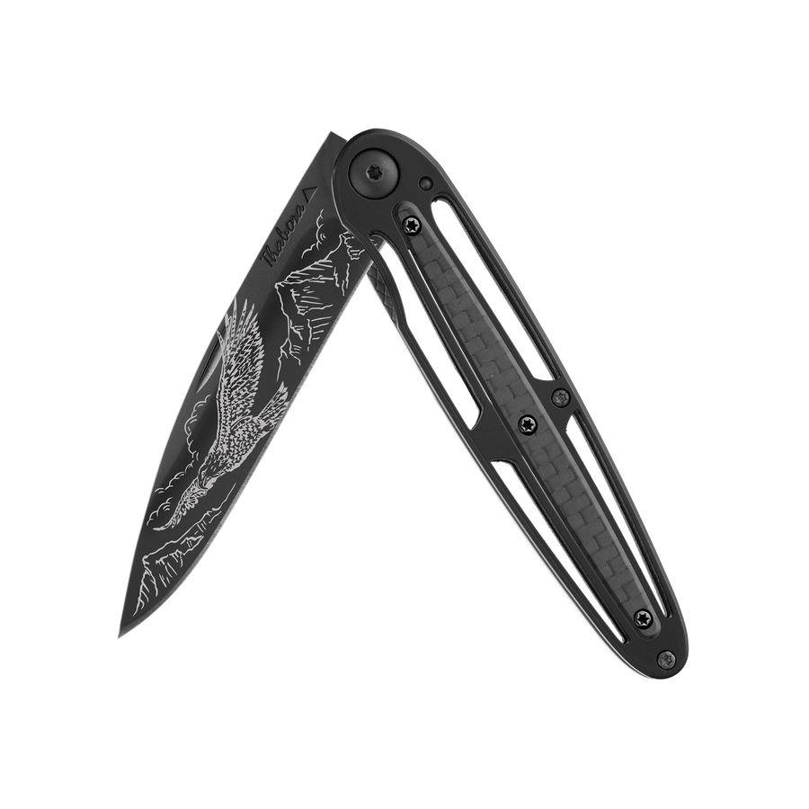 Couteau acier finition titane noir plaquette centrale carbone motif «aigle»