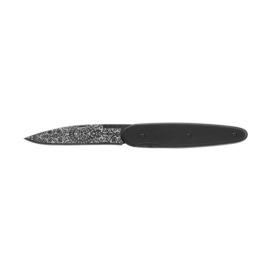 Couteau acier finition titane noir plaquette pleine résine g10 noir motif «tiki»