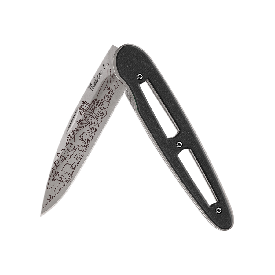 Couteau acier finition titane gris plaquette ajourée résine g10 noir motif «campagne»