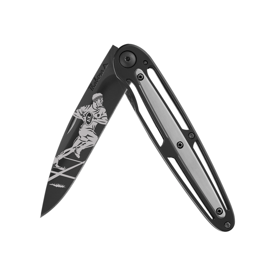 Couteau acier finition titane noir plaquette centrale acier brossé motif «rugbyman»