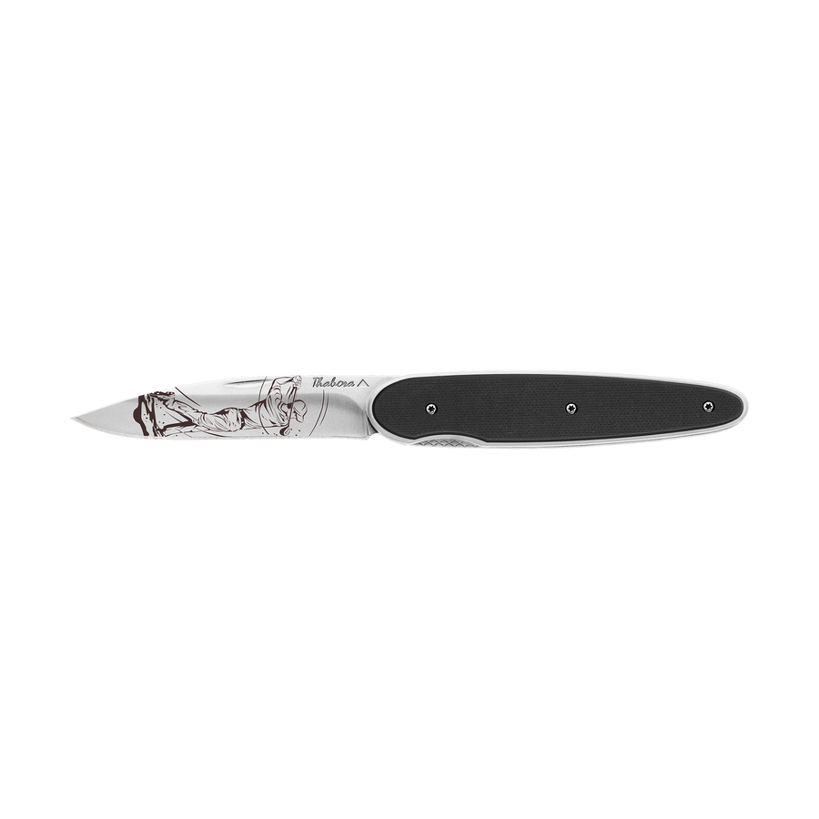 Couteau acier finition brillante plaquette pleine résine g10 noir motif «golfeur»