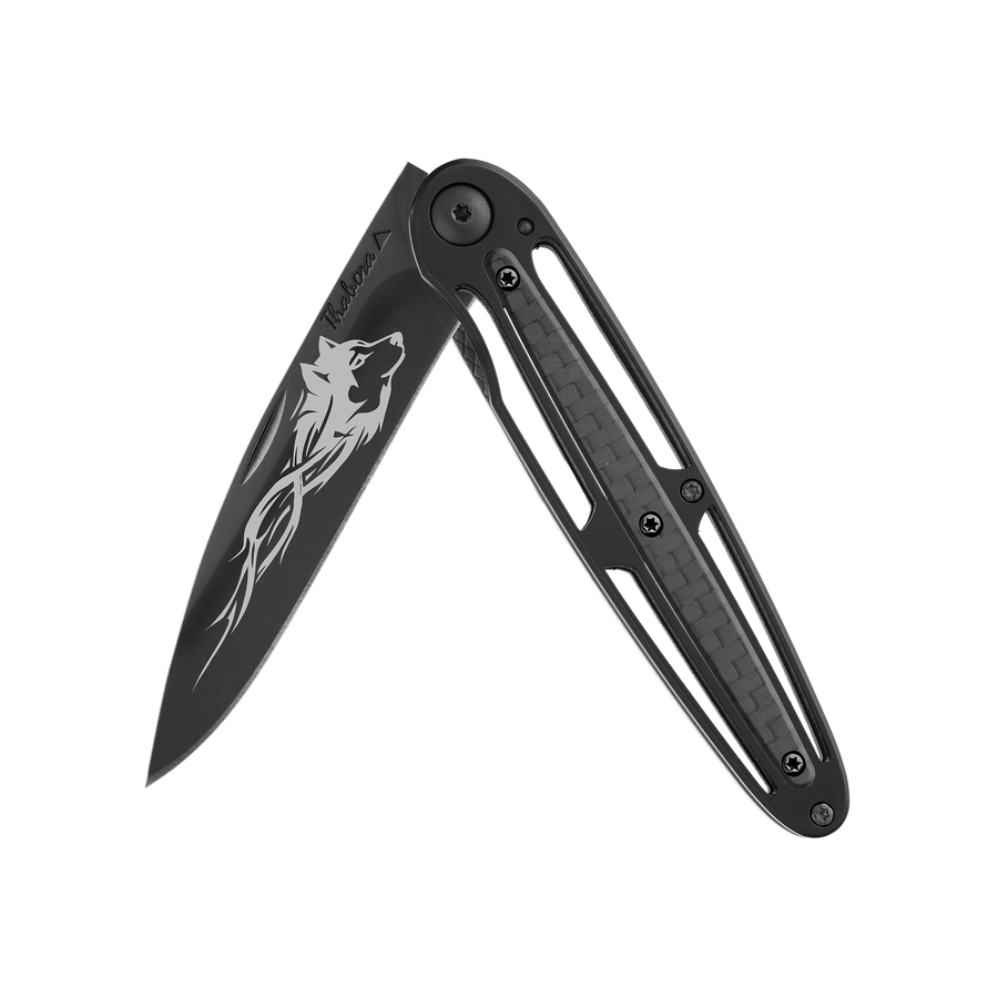 Couteau acier finition titane noir plaquette centrale carbone motif «loup tribal»