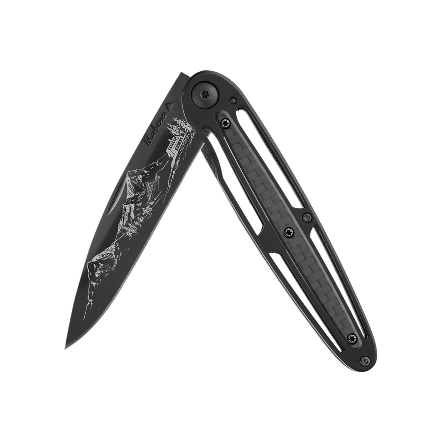 Couteau acier finition titane noir plaquette centrale carbone motif «montagne»