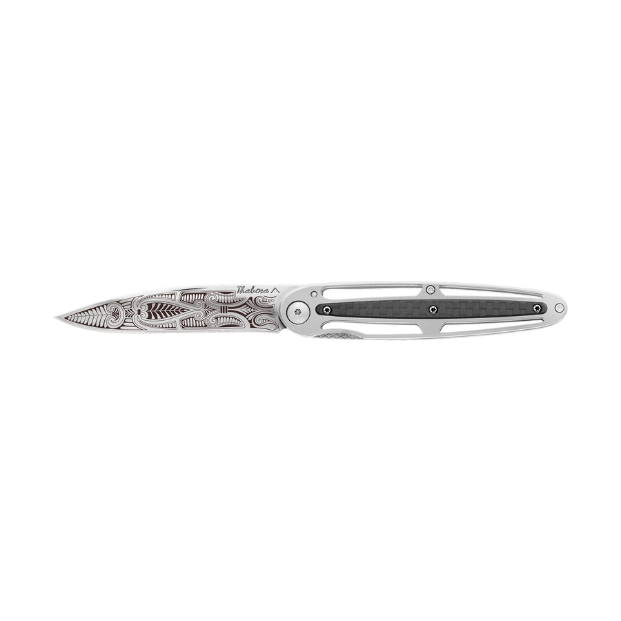 Couteau acier finition brillante plaquette centrale carbone motif «cachemire»