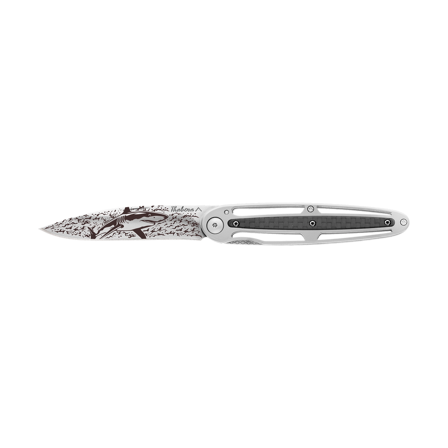Couteau acier finition brillante plaquette centrale carbone motif «requin»
