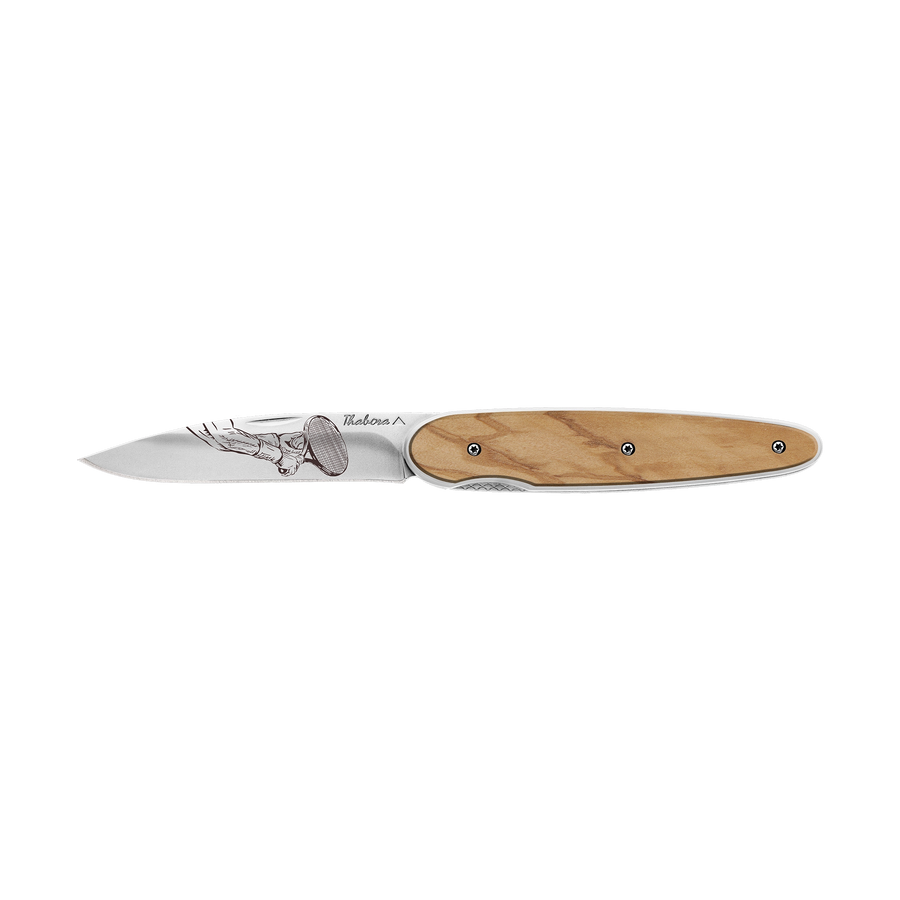 Couteau acier finition brillante plaquette pleine bois clair motif «raquette»