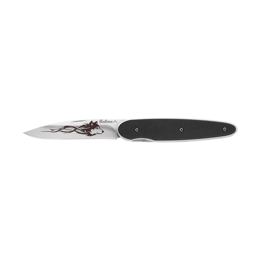 Couteau acier finition brillante plaquette pleine résine g10 noir motif «loup tribal»
