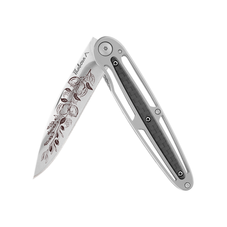 Couteau acier finition brillante plaquette centrale carbone motif «provencal»
