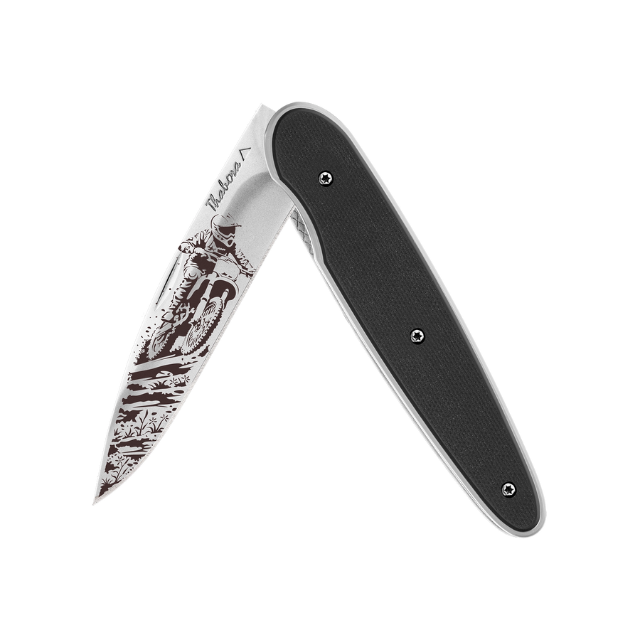 Couteau acier finition brillante plaquette pleine résine g10 noir motif «motocross»