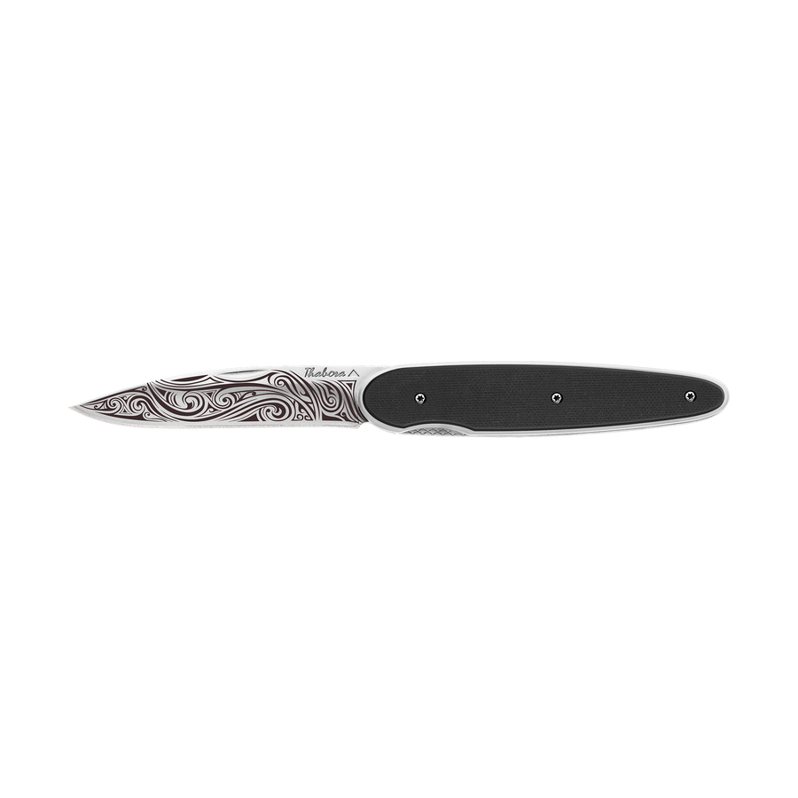 Couteau acier finition brillante plaquette pleine résine g10 noir motif «volutes»