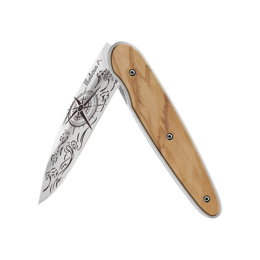 Couteau acier finition brillante plaquette pleine bois clair motif «navigation»