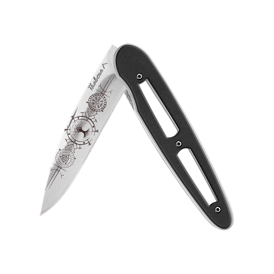 Couteau acier finition brillante plaquette ajourée résine g10 noir motif «runes viking»