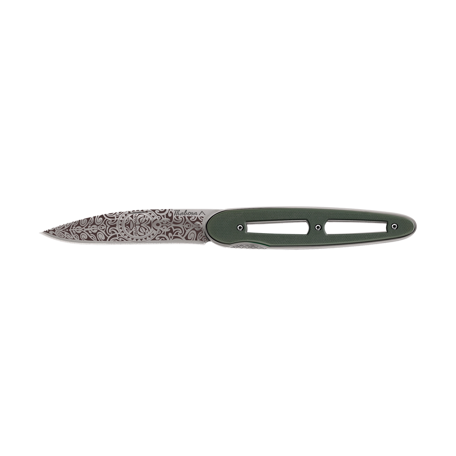 Couteau acier finition titane gris plaquette ajourée résine g10 kaki motif «tiki»