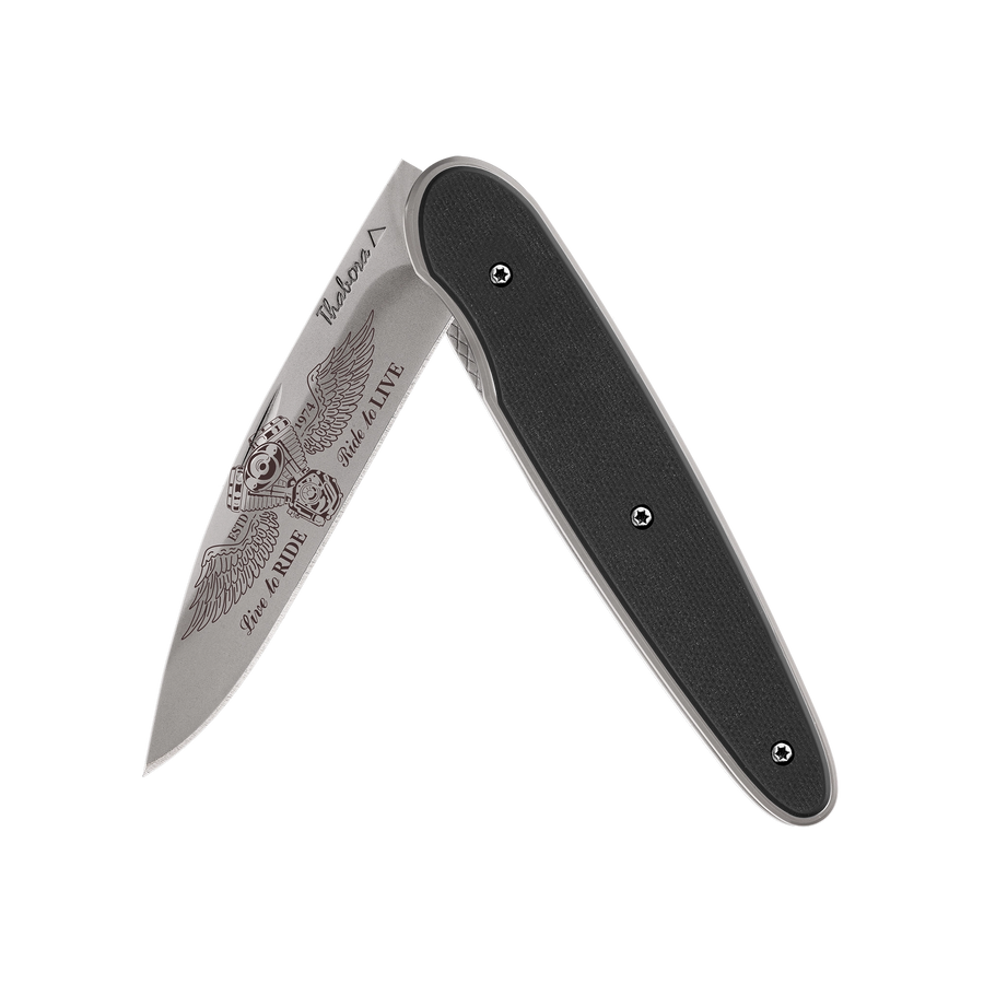 Couteau acier finition titane gris plaquette pleine résine g10 noir motif «biker ailes»
