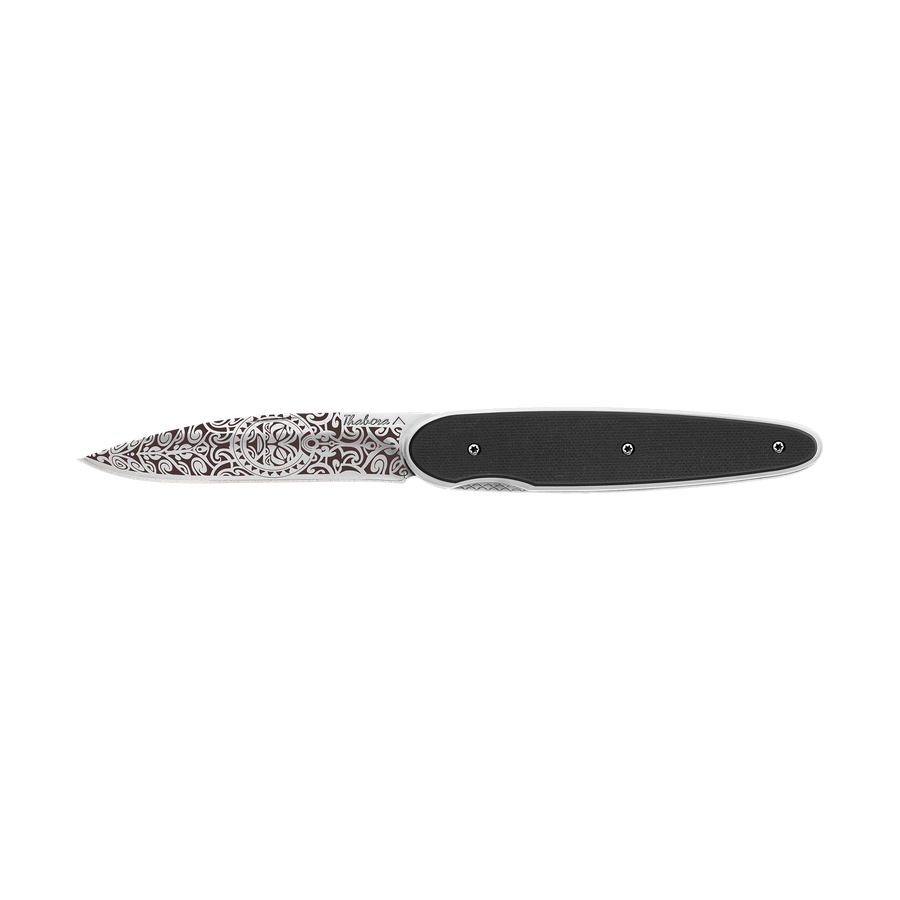 Couteau acier finition brillante plaquette pleine résine g10 noir motif «tiki»