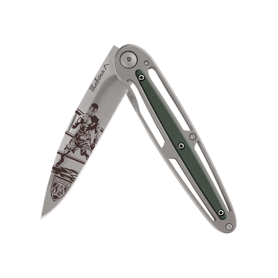 Couteau acier finition titane gris plaquette centrale résine g10 kaki motif «boxeur»