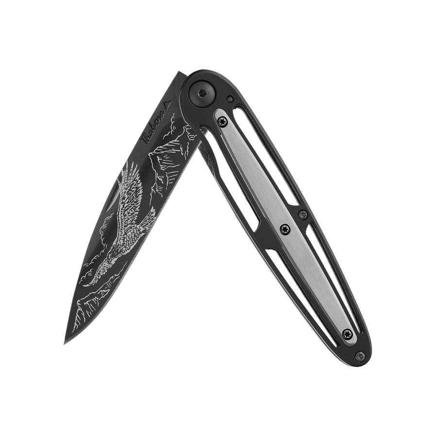 Couteau acier finition titane noir plaquette centrale acier brossé motif «aigle»
