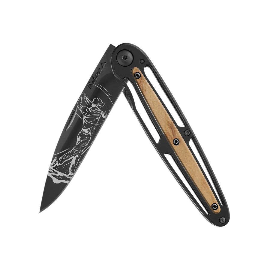 Couteau acier finition titane noir plaquette centrale bois clair motif «golfeur»