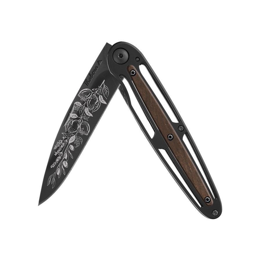 Couteau acier finition titane noir plaquette centrale bois foncé motif «provencal»