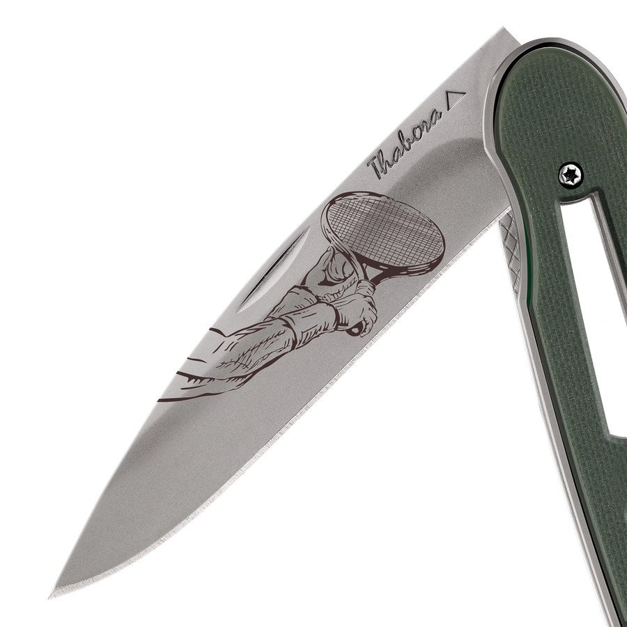 Couteau acier finition titane gris plaquette ajourée résine g10 kaki motif «raquette»