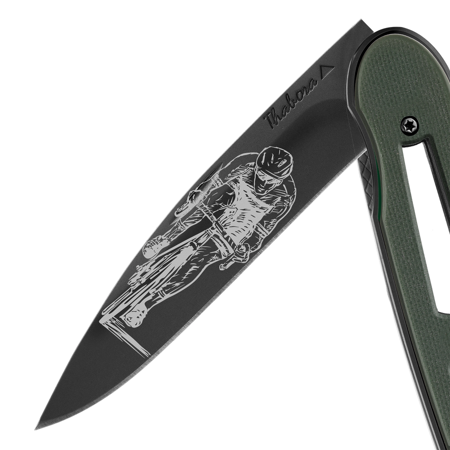 Couteau acier finition titane noir plaquette ajourée résine g10 kaki motif «cycliste»