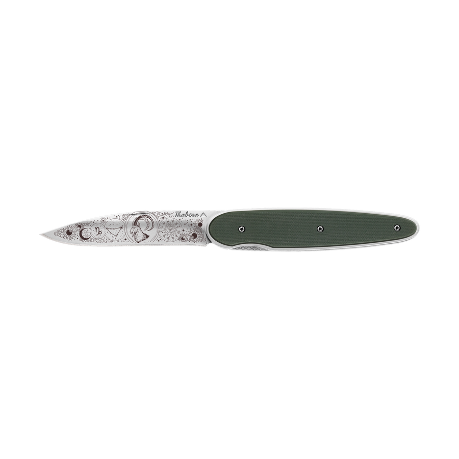 Couteau acier finition brillante plaquette pleine résine g10 kaki motif «zodiaque capricorne»