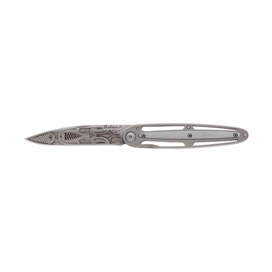 Couteau acier finition titane gris plaquette centrale acier brossé motif «cachemire»