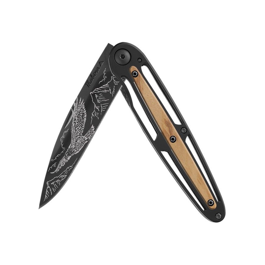 Couteau acier finition titane noir plaquette centrale bois clair motif «aigle»