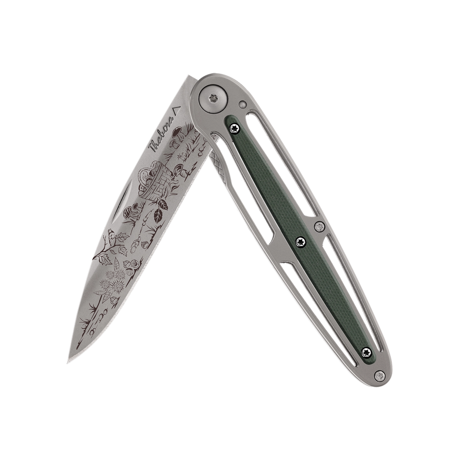 Couteau acier finition titane gris plaquette centrale résine g10 kaki motif «cueillette d'automne»