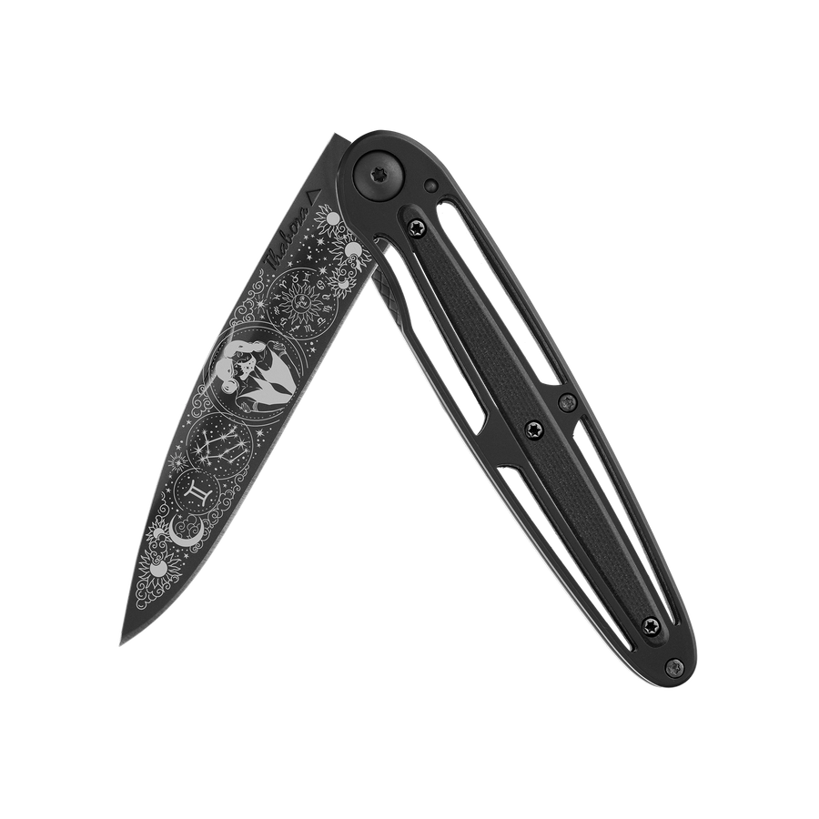 Couteau acier finition titane noir plaquette centrale résine g10 noir motif «zodiaque gémeaux»