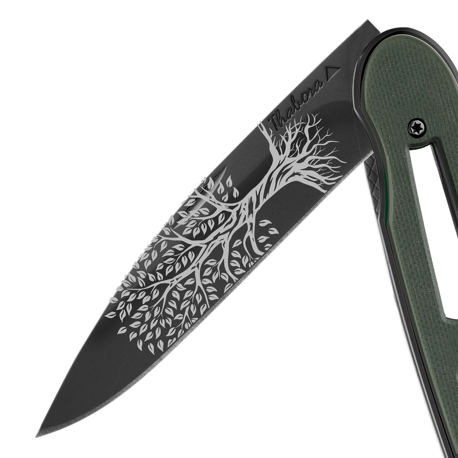 Couteau acier finition titane noir plaquette ajourée résine g10 kaki motif «arbre de vie»