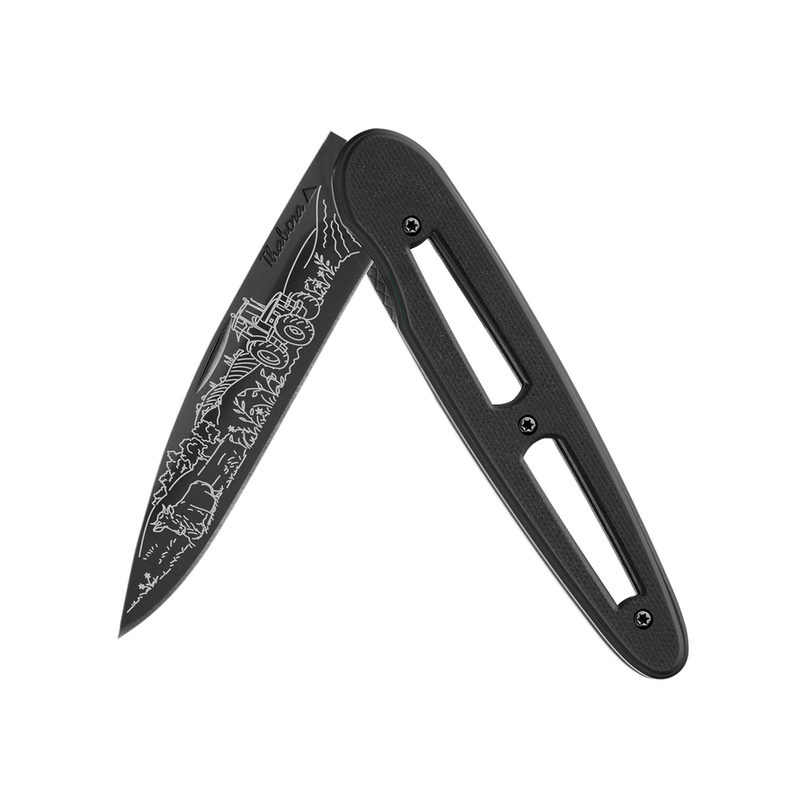Couteau acier finition titane noir plaquette ajourée résine g10 noir motif «campagne»