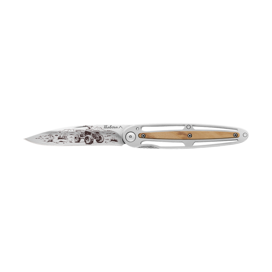 Couteau acier finition brillante plaquette centrale bois clair motif «quad»