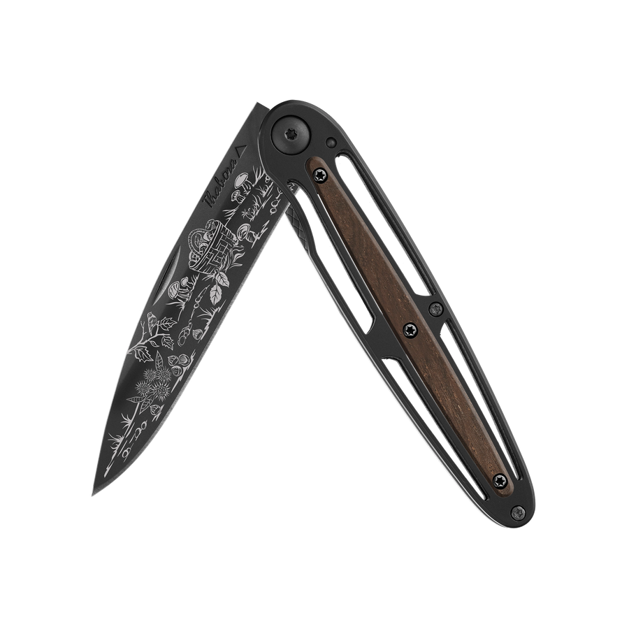 Couteau acier finition titane noir plaquette centrale bois foncé motif «cueillette d'automne»