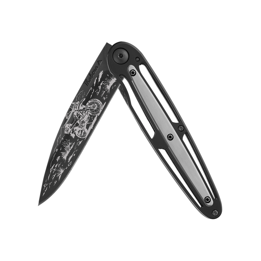 Couteau acier finition titane noir plaquette centrale acier brossé motif «trail»