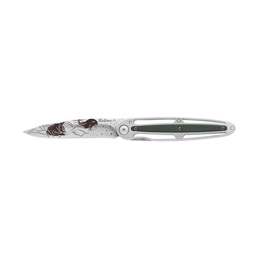 Couteau acier finition brillante plaquette centrale résine g10 kaki motif «femme dénudée»