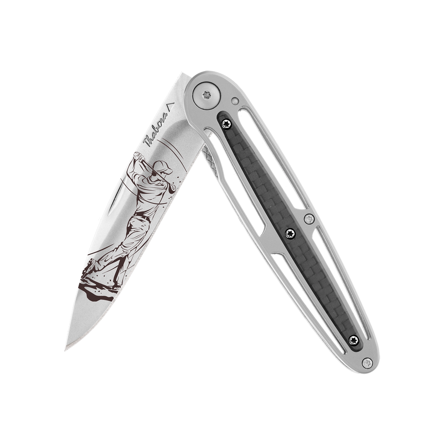 Couteau acier finition brillante plaquette centrale carbone motif «golfeur»
