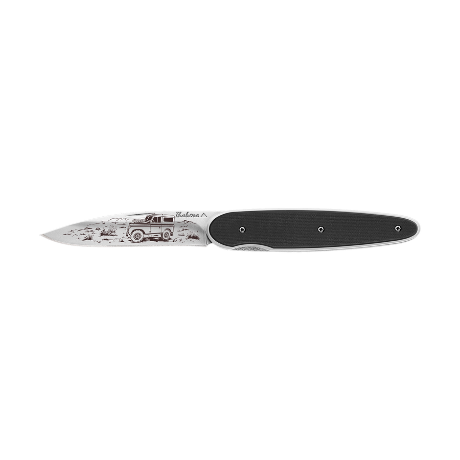 Couteau acier finition brillante plaquette pleine résine g10 noir motif «4x4»