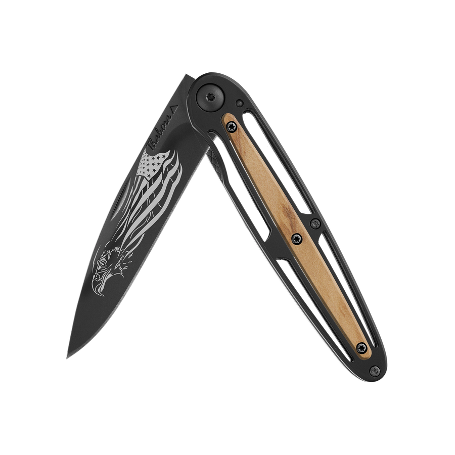 Couteau acier finition titane noir plaquette centrale bois clair motif «aigle américain»